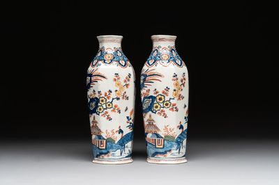 A pair of polychrome Dutch Delft octagonal chinoiserie vases, 18th C.