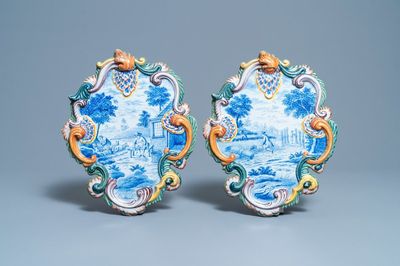 A pair of polychrome Dutch Delft plaques with countryside scenes, 19th C.