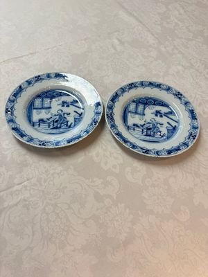 A pair of rare blue and white Dutch Delft 'Shoemaker' plates, 18th C. — photo 1