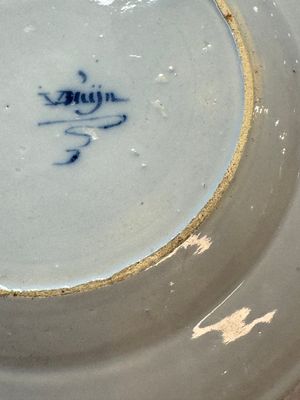 A pair of rare blue and white Dutch Delft 'Shoemaker' plates, 18th C. — photo 11