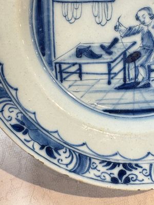 A pair of rare blue and white Dutch Delft 'Shoemaker' plates, 18th C. — photo 14