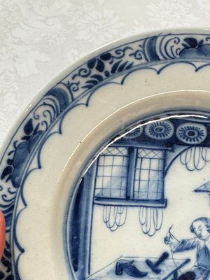 A pair of rare blue and white Dutch Delft 'Shoemaker' plates, 18th C. — photo 15