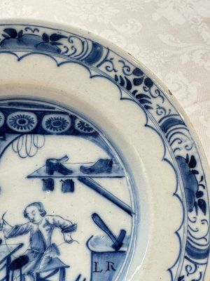 A pair of rare blue and white Dutch Delft 'Shoemaker' plates, 18th C. — photo 16