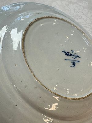 A pair of rare blue and white Dutch Delft 'Shoemaker' plates, 18th C. — photo 20