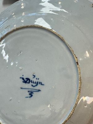 A pair of rare blue and white Dutch Delft 'Shoemaker' plates, 18th C. — photo 22
