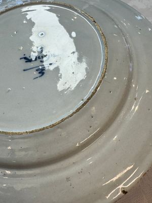 A pair of rare blue and white Dutch Delft 'Shoemaker' plates, 18th C. — photo 23
