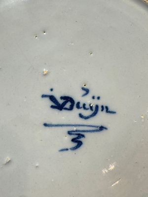 A pair of rare blue and white Dutch Delft 'Shoemaker' plates, 18th C. — photo 25