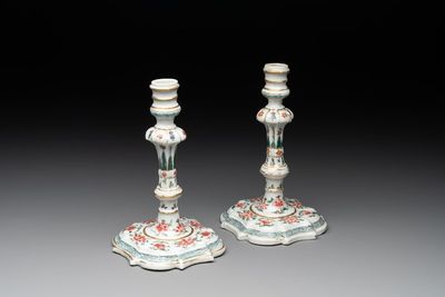 A pair of rare Chinese export famille rose candlesticks with floral design, Yongzheng/Qianlong