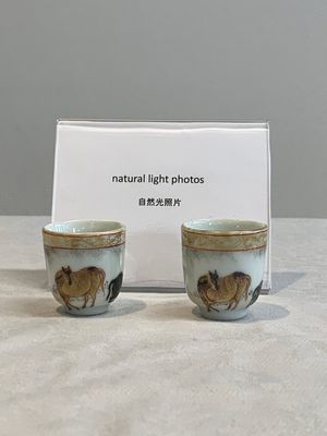 A pair of rare Chinese gilt-decorated grisaille and iron-red miniature 'horse' cups, Yongzheng/Qianlong — photo 1