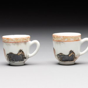 A pair of rare Chinese gilt-decorated grisaille and iron-red miniature 'horse' cups, Yongzheng/Qianlong — photo 1