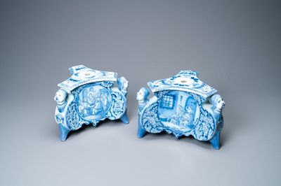 A pair of rare Dutch Delft blue and white candlestick bases, late 17th C.