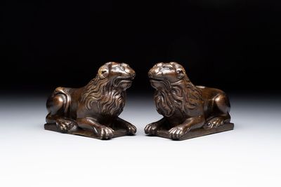 A pair of reclining bronze lions, probably Dinant, 16th C.