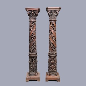 A pair of reticulated carved oak Corinthian columns with cherub heads and vines, 17th C. — photo 1