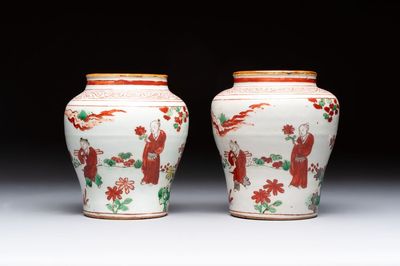 A pair of small Chinese wucai jars with sages in a landscape, Transitional period