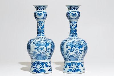 A pair of tall Dutch Delft blue and white chinoiserie vases, 1st half 18th C.