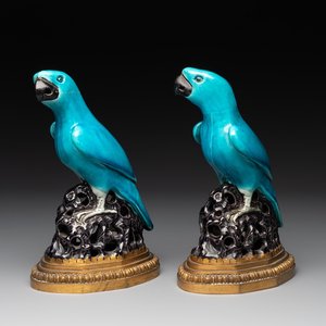 A pair of turquoise- and aubergine-glazed parrots with gilt bronze mounts, Kangxi — photo 1