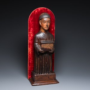 A partly gilded and polychromed wood sculpture of a monk holding a chest, probably Spain, 16th C. — photo 1