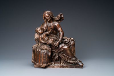 A patinated wooden group of Saint Anne with the infant Jesus on an inscribed base, ca. 1540