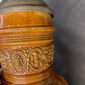A 'Peasants dance' stoneware jug with pewter lid, Raeren, dated 1578 — photo 16