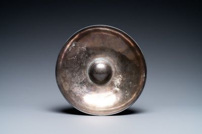 A Persian silver bowl with raised center, 8/12th C.