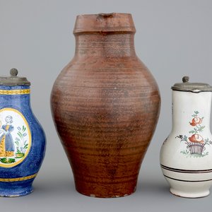 A pewter-mounted Brussels faience jug, a large Raeren jug and a Northern-French jug, 18/19th C. — photo 1
