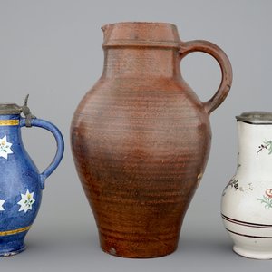 A pewter-mounted Brussels faience jug, a large Raeren jug and a Northern-French jug, 18/19th C. — photo 2