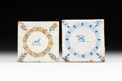 A polychrome and a blue and white Dutch Delft tile with an animal in an aigrette border, Haarlem, early 17th C.