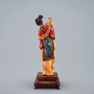 A polychrome Chinese carved ivory figure of Guanyin on wood base, 19th C. — photo 4