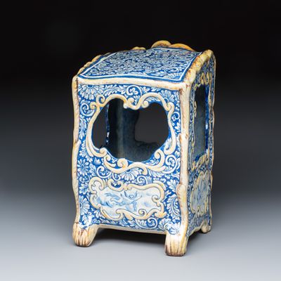 A polychrome Delft style French faience model of a carriage, 19th C.