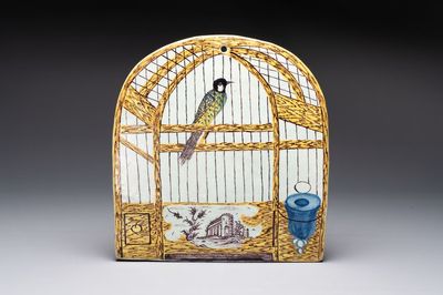 A polychrome Dutch Delft 'bird cage' plaque, 18th C.