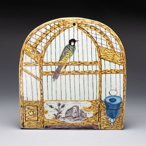 A polychrome Dutch Delft 'bird cage' plaque, 18th C. — photo 1