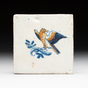 A polychrome Dutch Delft 'bird on a branch' tile, 17th C. — photo 1