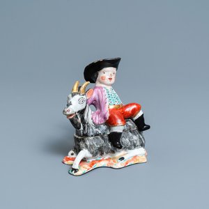 A polychrome Dutch Delft box and cover in the shape of a boy on a goat, 18th C. — photo 1