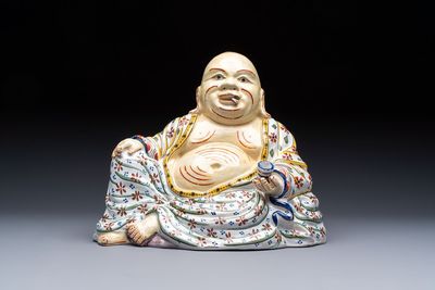 A polychrome Dutch Delft 'Budai' figure, 19th C.