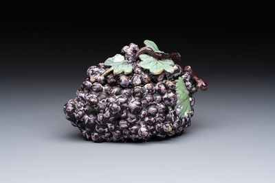 A polychrome Dutch Delft 'Bunch of Grapes' tureen and cover, 18th C.