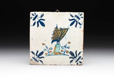 A polychrome Dutch Delft 'butterfly' tile, 17th C.