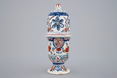 A polychrome Dutch Delft caster with lightning decoration, late 17th C.