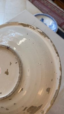 A polychrome Dutch Delft chinoiserie dish with flower vases, a bird and insects — photo 12
