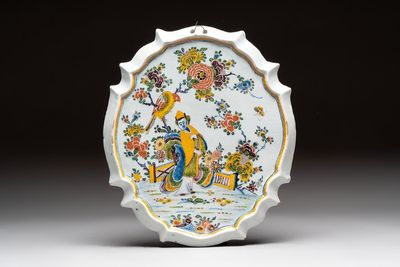A polychrome Dutch Delft chinoiserie plaque, 18th C.