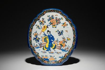 A polychrome Dutch Delft chinoiserie plaque, 18th C.