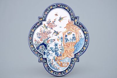 A polychrome Dutch Delft chinoiserie plaque, 19th C.