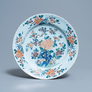 A polychrome Dutch Delft dish with fine floral design, 18th C. — 照片 1