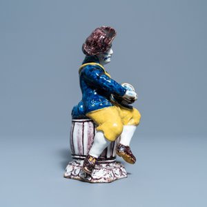 A polychrome Dutch Delft figure of a hurdy-gurdy player, 18th C. — photo 6