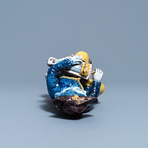 A polychrome Dutch Delft figure of a hurdy-gurdy player, 18th C. — photo 7