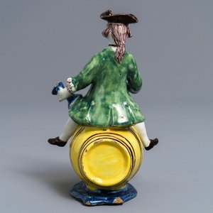 A polychrome Dutch Delft figure of a man on a barrel, 18th C. — 照片 4