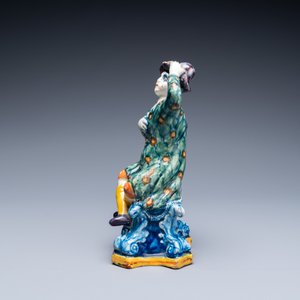 A polychrome Dutch Delft figure of a seated man, 18th C. — 照片 5
