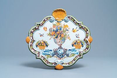 A polychrome Dutch Delft 'flower vase' plaque, 18th C.
