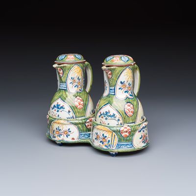 A polychrome Dutch Delft 'Four hearts' oil and vinegar set, 18th C.