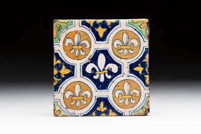 A polychrome Dutch Delft 'French lilies' tile, ca. 1600