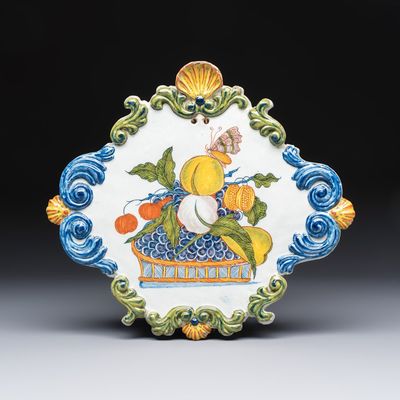 A polychrome Dutch Delft 'Fruit Basket' plaque, 18th C.
